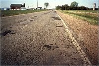 Badly deteriorated roadway