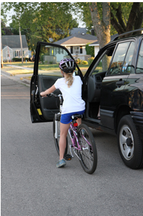 Example of car door interfering with bicycle rider.