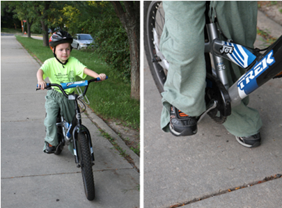 Boy bicycle rider with wrong type of pants that could get caught.
