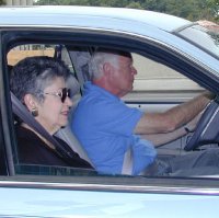 Older drivers driving in automobile