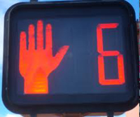 red hand and timer crosswalk light