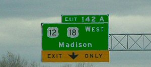 Example of a right-hand exit sign.