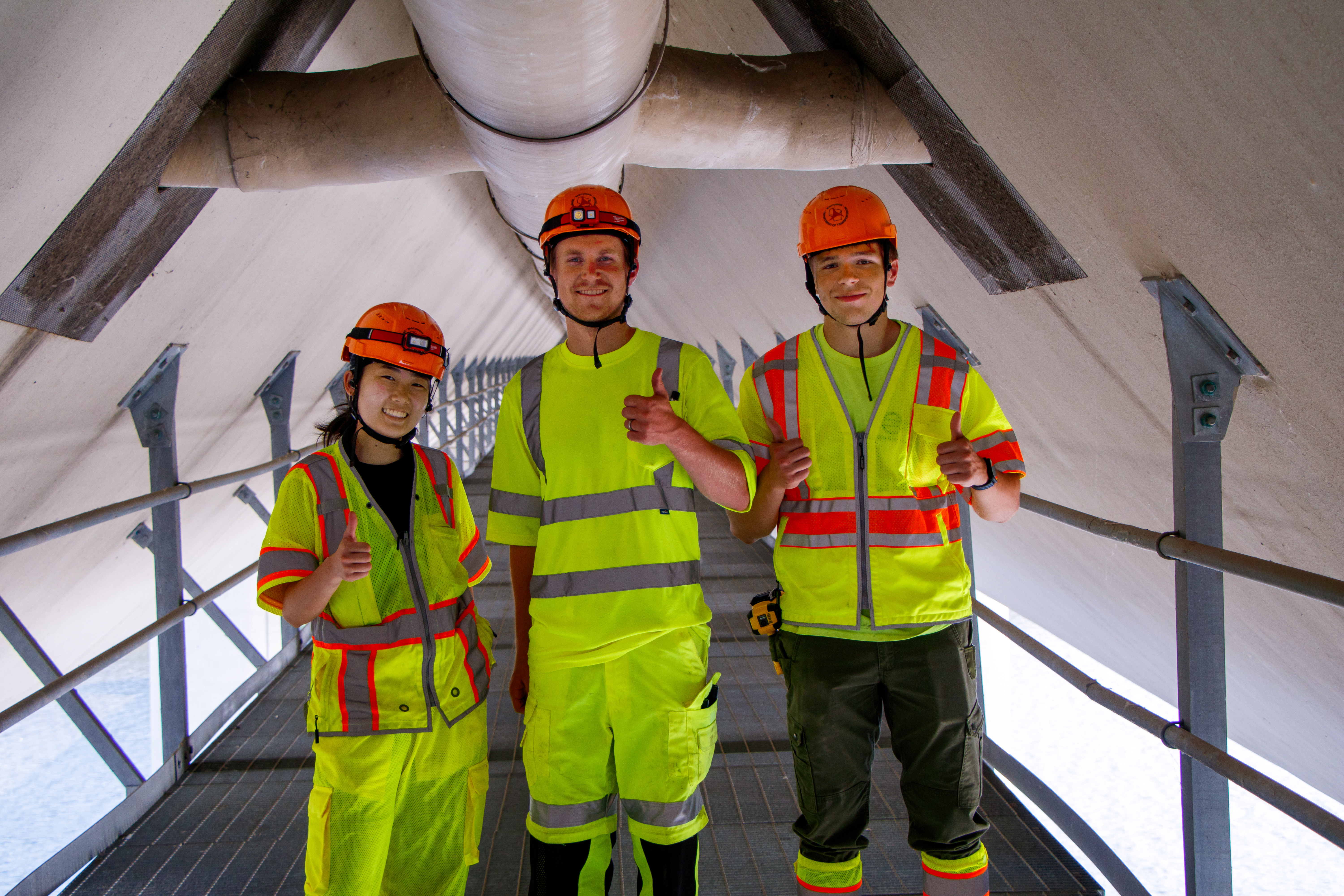 Student interns surveying bridge