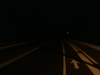 WIS 47 in Keshena before lighting was installed, the road is very dark and there is poor visibility.