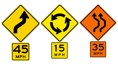 Speed advisory signs, orange and yellow signs with black numbers and letters: 45, 15 and 35 miles per hour.