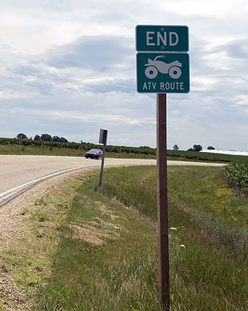 Signage marking the end of an ATV Route