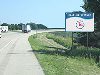 Roadside sponsor sign on highway