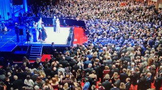 VIPs standing on a stage infront of a large crowd during the RNC in Milwaukee