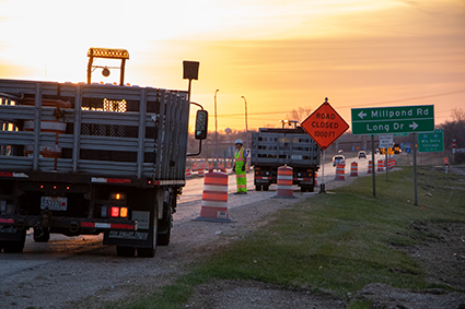 A work zone at sunset.