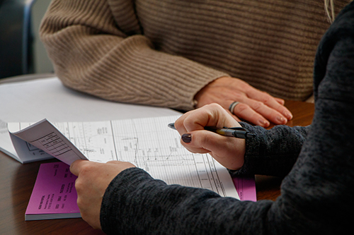 Engineers reviewing a set of plans